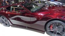 Mansory Ferrari F12 La Revoluzione and Mansory Lamborghini Aventador Roadster Carbonado with stand